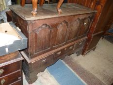 A circa 1800 peg-joyned Oak Mule Chest converted to a cupboard and having a pair of opposing doors