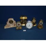 A quantity of clocks including tapestry and metal framed, pink marble, Anniversary clock, etc.