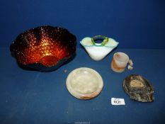 A glass amber coloured bowl and a hand blown glass handbag, onyx ashtray, metal ashtray etc.