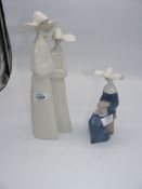 Three Lladro nuns.