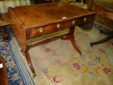 A fine quality period mixed woods Sofa Table having a highly polished darkwood strung and