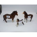 A Beswick bay mare and foal and Beswick horse.