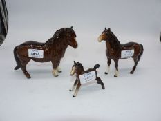 A Beswick bay mare and foal and Beswick horse.