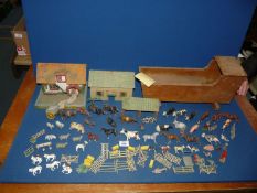 A quantity of farm animals and model farm buildings, some being Britains.