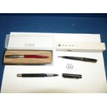 Three Parker ballpoint pens including two in boxes.