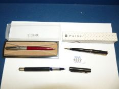 Three Parker ballpoint pens including two in boxes.