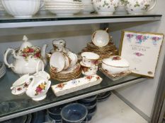 A quantity of Royal Albert Old Country Roses including three dinner plates, six small plates,