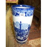 A Victorian ware stick stand pot decorated with a classical town scene.