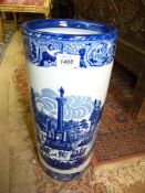 A Victorian ware stick stand pot decorated with a classical town scene.