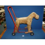 A Push Along Dog made by International Model Aircraft Ltd., 24'' approx.