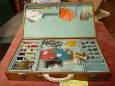 A post war fly tying kit in a wooden box.