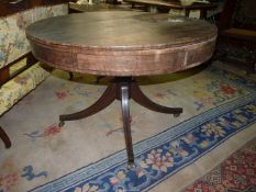 A most uncommon 19th century Mahogany rent table of drum form having four drawer recesses (sadly