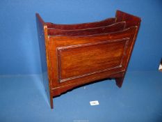 A Magazine Rack labelled Barker's Depository of Kensington March 22 1923, 15" wide x 14 1/2" high.
