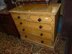 A Pine carcassed Chest of three long and two short Drawers with ebonised knobs and having a combed