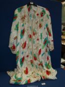 A vintage Moroccan silk Kaftan with brush stroke pattern in vivid red, green and brown.