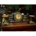 An Art Deco style orange and black marble mantle Clock Garniture with green onyx surround to the