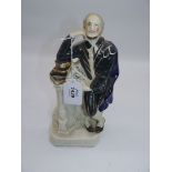 An early Staffordshire pottery portrait figure of Shakespeare c. 1860, 10 3/4'' tall.