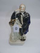 An early Staffordshire pottery portrait figure of Shakespeare c. 1860, 10 3/4'' tall.