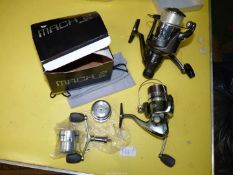 A boxed Shakespeare Mach 2 3500 FD reel with 100m 3lb line spool, a 185m 6lb line spool,