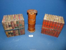 Two Huntley & Palmer Biscuit tins in the form of Books and a four compartment treen Pot.
