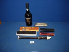 A sealed bottle of Cockburns Special Reserve Port, Hohner harmonica, cased ballpoint pen,