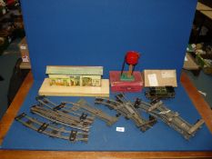 A quantity of Hornby 'O' gauge accessories including station, locomotive, track, etc.