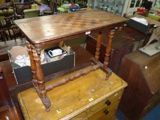 A 19th century Walnut and other woods occasional Table standing on four turned supports,