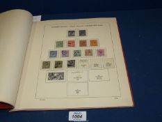 A red Schauber Stamp Album - a specialist GB album of Queen Victoria to Queen Elizabeth II
