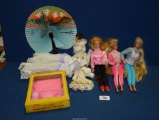 Three Barbie Dolls (two dated 1976) and a boxed dolls Teaset, fan etc.