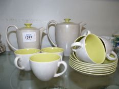 A Poole Pottery coffee set, grey outer/green inner, including six cups and saucers,