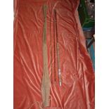 A Sansums three piece split cane glass top 11' course rod.