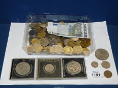 A large quantity of mixed foreign coins including euros, cents, francs, etc.