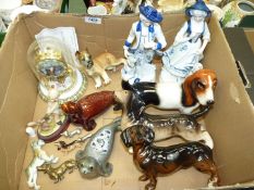A quantity of ornaments including Coopercraft Dachshund Leonardo lady and gent with dogs,