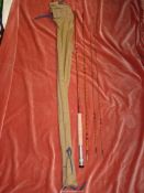 An Aspen Dale three piece (two tips) 10' Test Dale fishing rod in original bag.