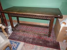 An unusual refectory table the Oak base having peg joined stop - chamfered legs united by perimeter