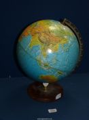 A George Phillip & Son Ltd. London Globe on wooden stand, dated 1969, a/f.