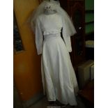 A 1960's Wedding dress from Rackham's with veil, size small,