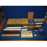 A quantity of early and mid 20th century architectural/surveying equipment including rulers and