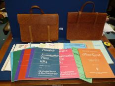 A large quantity of music books mostly for piano amd flute, two leather cases, etc.