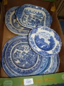 Nine pieces of blue and white china including meat and serving plates and a Crown Ducal tureen.