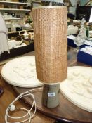 A studio pottery dome shaped Lamp base with rattan effect cylindrical shade, 19 1/4'' tall.