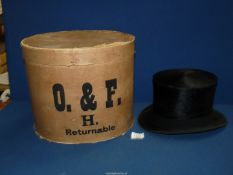 A hatbox and a silk top-hat by Christy's London in very good condition, size small/medium.