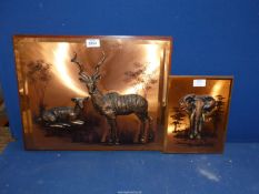 Two raised copper pictures one of elephant 8" x 10" and the other antelopes,