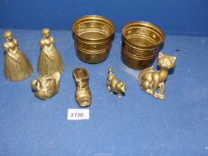 A small quantity of brass including pots, lady, cat, swan ornaments etc.
