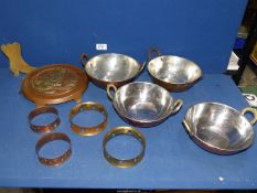 A small quantity of copper including pans, stand depicting a chick hatching, etc.