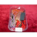 A quantity of costume jewellery including necklaces.