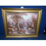 A gilt framed Oil on canvas depicting a river scene with a small cottage on the bank,