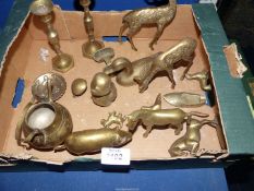 A quantity of brass including deer ornaments, pair of candlesticks, duck, pig etc.