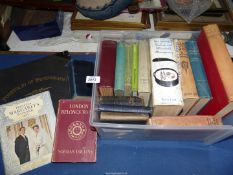A tub of books including; The Wind in The Willows, Mrs Beeton, Tales from Ebony,