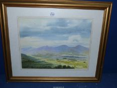 A framed and mounted watercolour by Olwyn Parker 'Ludlow from Clee Hill', 23'' x 19''.